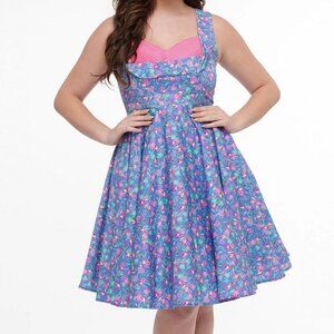 Dolly & Dotty - Grace Purple Pleated Dress in Flamingo Leaf Print. US 12/UK 16